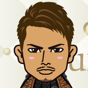 ���߂���