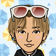 �߂���