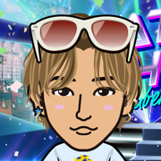�߂���