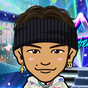 ���߂���