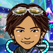 ���߂���