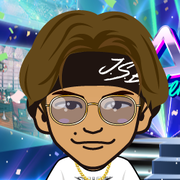 ���߂���