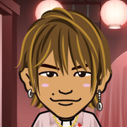 ���߂���