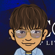 ���߂���