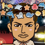 �߂���